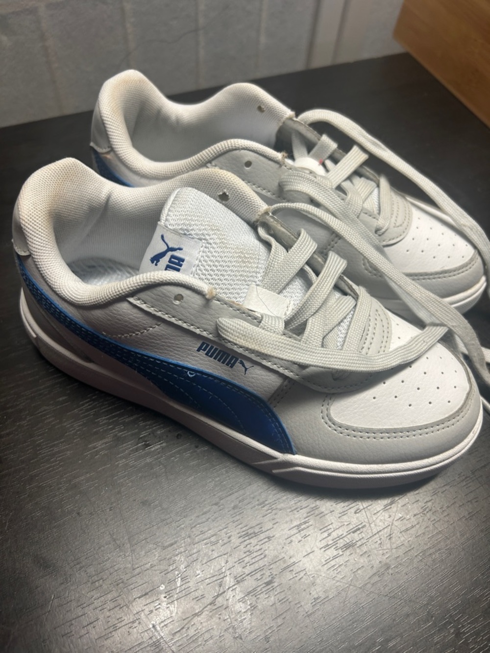 Puma Kids White Sneakers with Blue Side Stripe